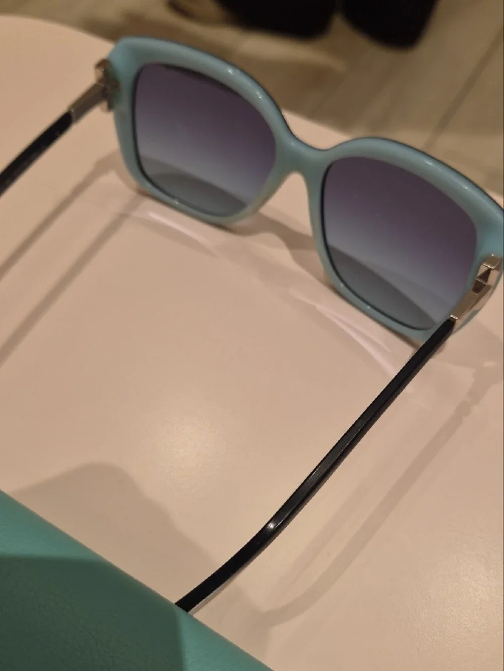 Tiffany & Co. Black Cat-Eye Sunglasses with Purple-Tinted Lenses
